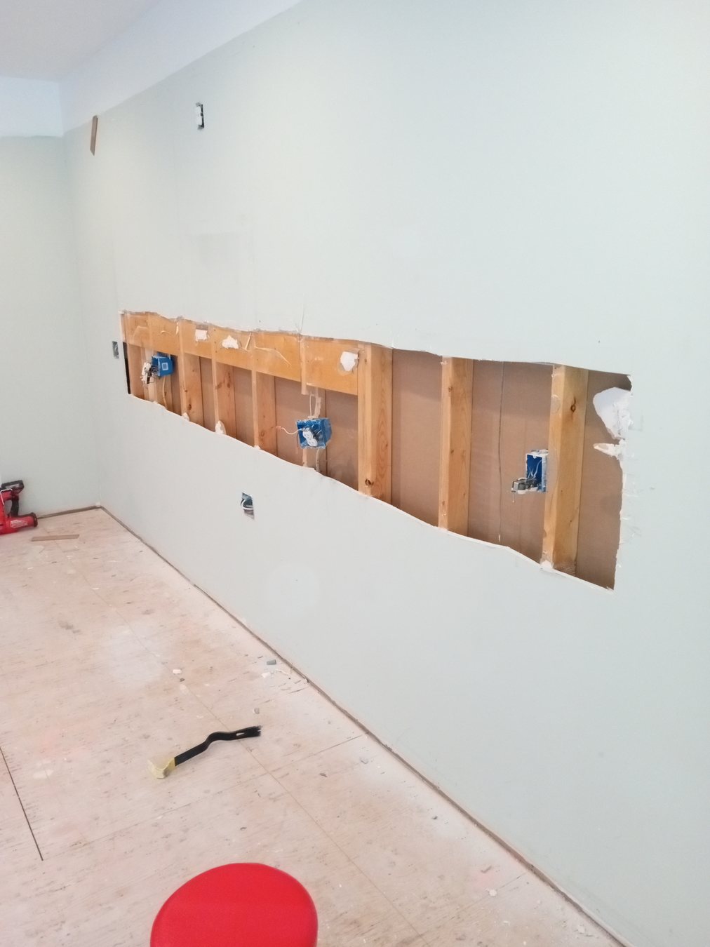 Drywall cutout prepared for a careful patch