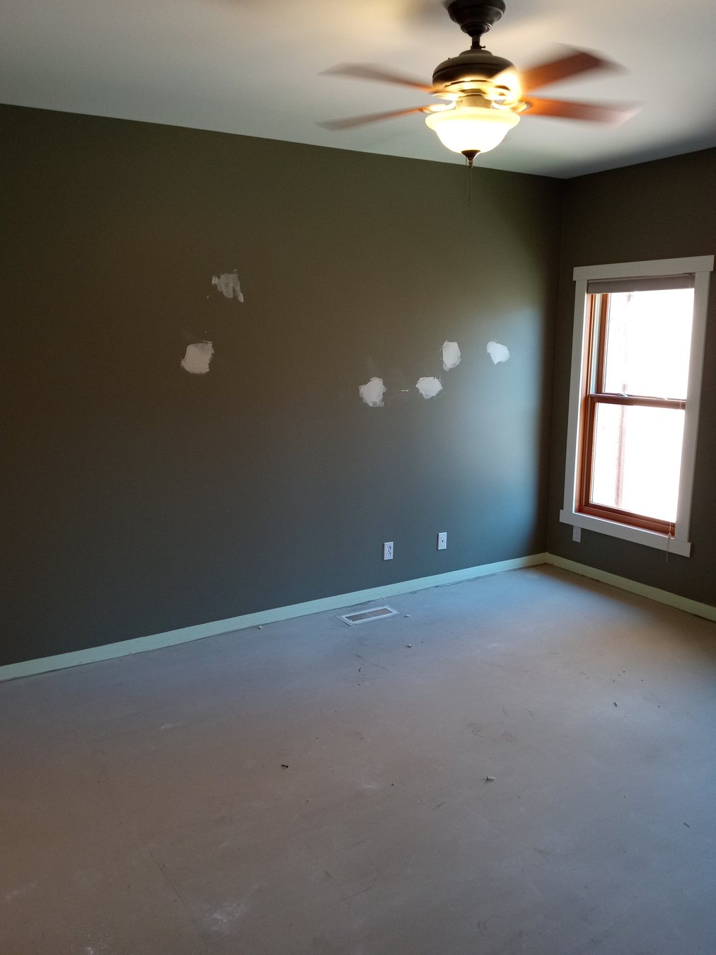 Interior wall prepared with paint touch-up patches